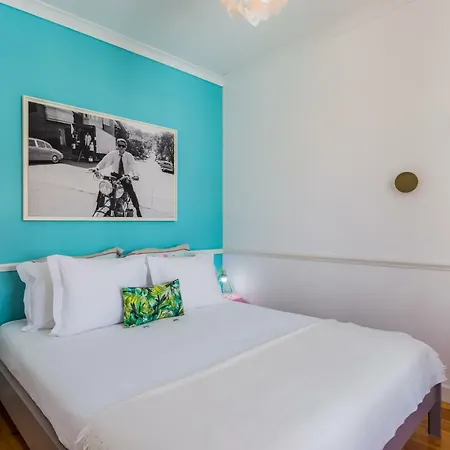 Your Colorful Nest With Balcony Over The River